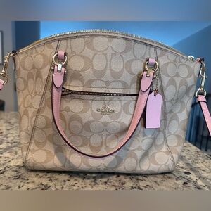 Coach Purse. Light khaki blossom. Tags removed but available.Brand new condition
